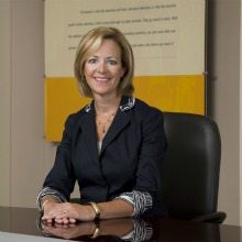 G. Schumm_Headshot_High Res Desk