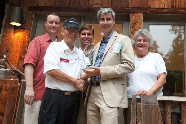 Emcee Mark Anderson of BDO, award presenter Art Hurtado of Altamira Technologies Corporation, emcee Carl Grant of Cooley and Patrick Rasche of Excella Consulting as Excella Consulting and NVTC President and CEO Bobbie Kilberg accepts the award for Hottest Company Culture at the 2013 NVTC Hot Ticket Awards on June 26 (photo credit to David Kidd/NVTC)