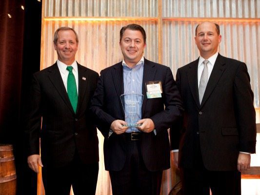 NVTC Chair Emeritus Brad Antle of Salient Federal Solutions, Chris Smith of Invincea, and Wayne Lucernoni of Harris IT Services as Smith accepts the Cyber award on behalf of Invincea during the 2013 Innovator Awards at TechCelebration: NVTC’s Annual Banquet on Oct. 30, 2013 at The Ritz-Carlton Tysons Corner.