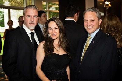 Pictured: Brian Neely (AMERICAN SYSTEMS), Roberta Neely and Bill Hoover (AMERICAN SYSTEMS)