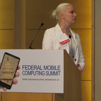 Camille Tuutti (Nextgov) moderates a panel on solutions for citizen services.