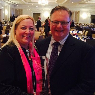 Lynn Ann Casey and Rob O'Keefe of ArcAspicio, 2014 GovCon Awards Program of the Year Winners