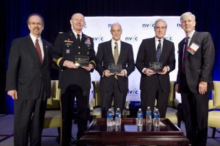 From left: NVTC Board Member Greg Baroni of Attain, Lt. Gen. Edward Cardon, former Department of Homeland Security Secretary Michael Chertoff, former FBI Director Robert Mueller, and NVTC Vice Chair Todd Stottlemyer of Acentia