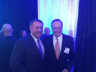 NCI Inc. CEO Brian Clark and Paul Lombardi (NCI Inc. Board of Directors member)