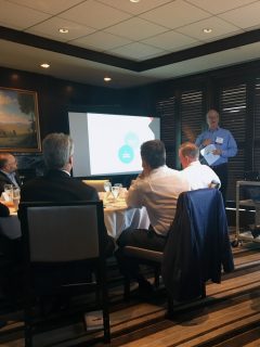 Alan Berson (standing on right) speaking to the WashingtonExec General Managers Council.