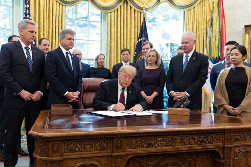 President Donald J. Trump signs the Cybersecurity and Infrastructure Security Agency Act Friday, Nov. 16, 2018, in the Oval Office of the White House. (Official White House Photo by Joyce N. Boghosian)