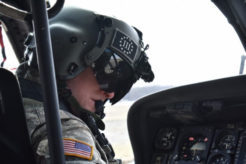 A N.Y. Army National Guard pilot assigned to 3rd Battalion, 142nd Aviation, prepares for a flight in a UH-60 Black Hawk Helicopter at Army Aviation Support Facility # 3 in Latham, N.Y., on April 5, 2018. The 3-142nd was flying Siena College students with the Reserve Officer Training Corps to Burlington, V.T. for their monthly training. (N.Y. Army National Guard photo by Spc. Andrew Valenza)