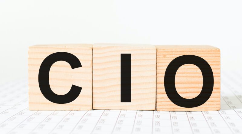 a word CIO on wooden cubes. business concept. business and Finance